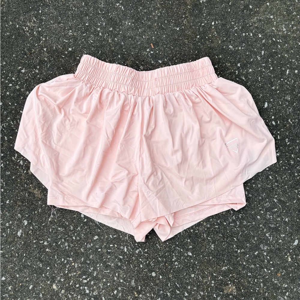 Light pink shorts, has built in shorts and are very comfortable.